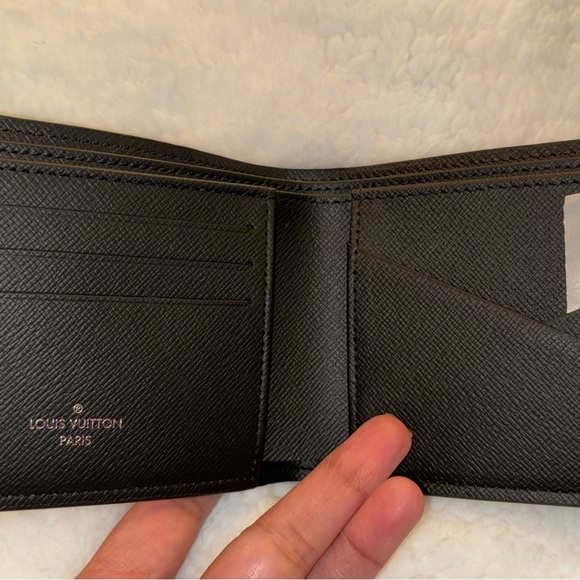 Louis Vuitton Multiple Wallet ‭4.5 x 3.5 x 0.6 inches ‬
‭length x Height x Width - Picture 5 of 7